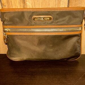 Small Dark Brown Michael Kors hand bag. New never used